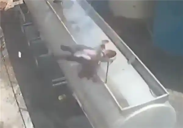 油罐车惊魂一刻：男子叼烟开盖瞬间被气浪掀飞